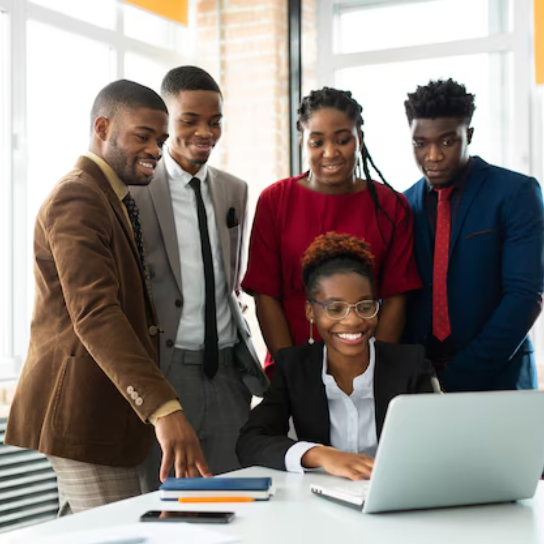 Diverse group of young Nigerian professionals collaborating